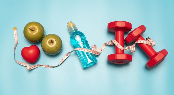 Fitness equipment. Healthy food. water,apple